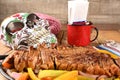 roast beef with seasonings and sliced Ã¢â¬â¹Ã¢â¬â¹barbecue salad served on plate on wooden table Royalty Free Stock Photo